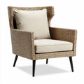 Woven patio chair with beige cushion and black metal legs 80 x 70 x 90cm