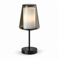 Glass and metal table lamp with modern design for home or office use